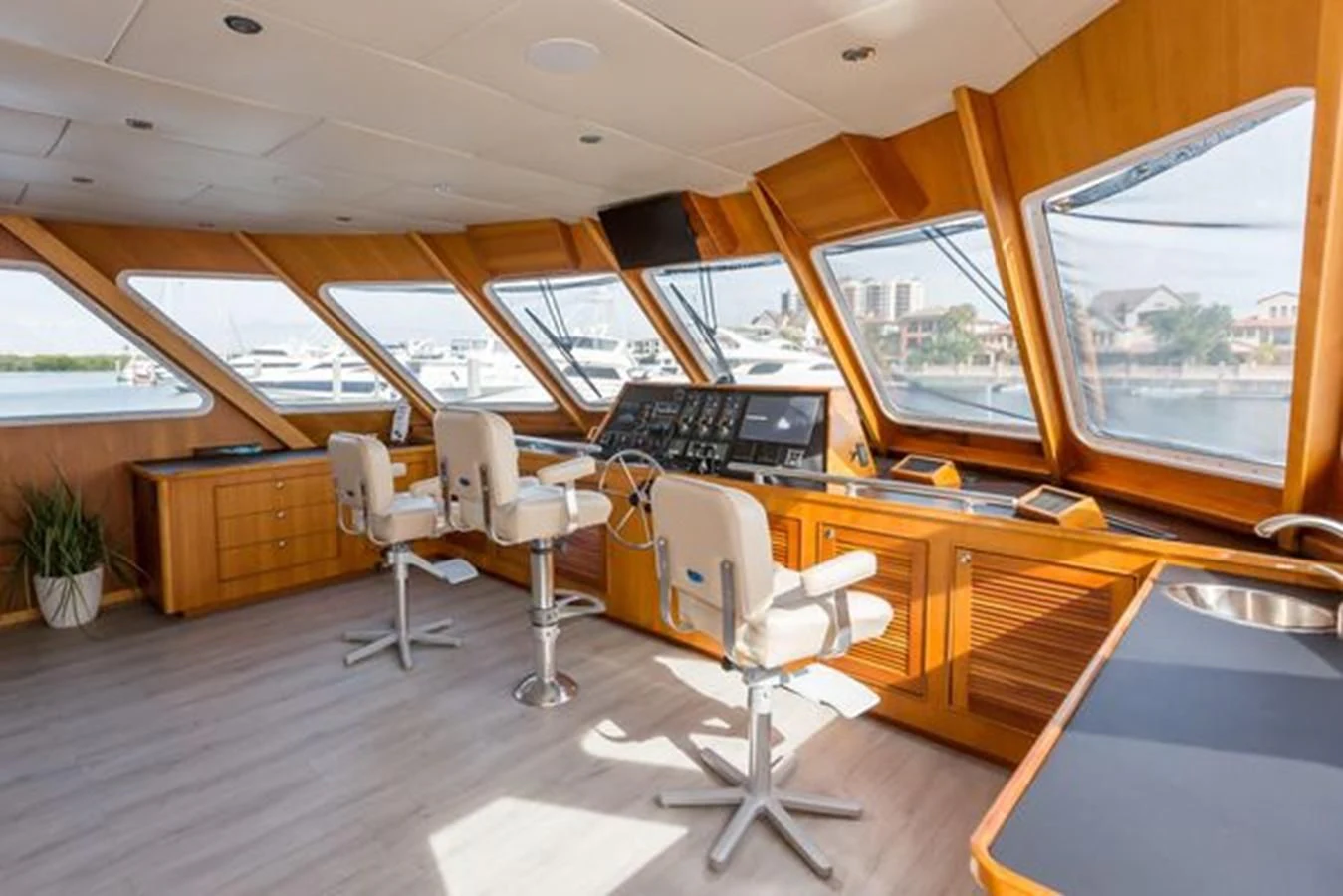 a room with chairs and tables aboard ISLAND SOUL Yacht for Sale