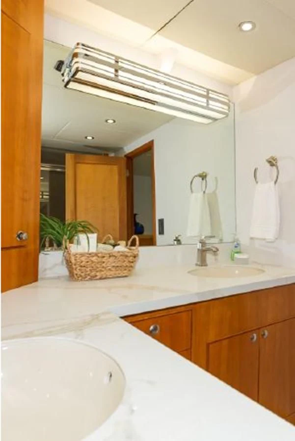 a bathroom with a large mirror aboard ISLAND SOUL Yacht for Sale