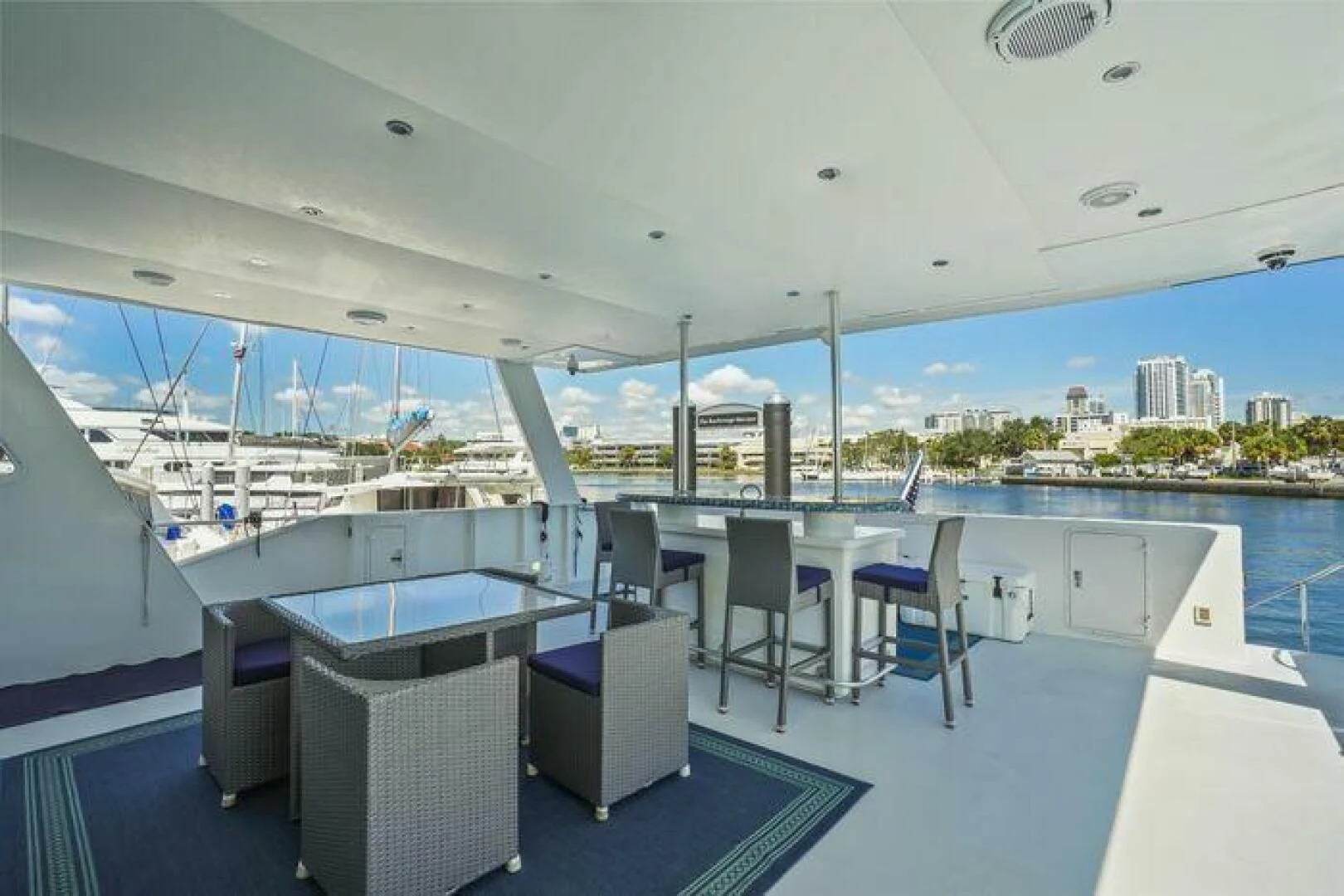 a large balcony overlooking a city aboard ISLAND SOUL Yacht for Sale