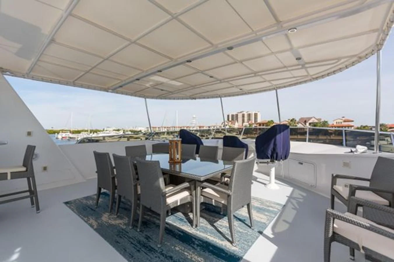 a room with a table and chairs aboard ISLAND SOUL Yacht for Sale
