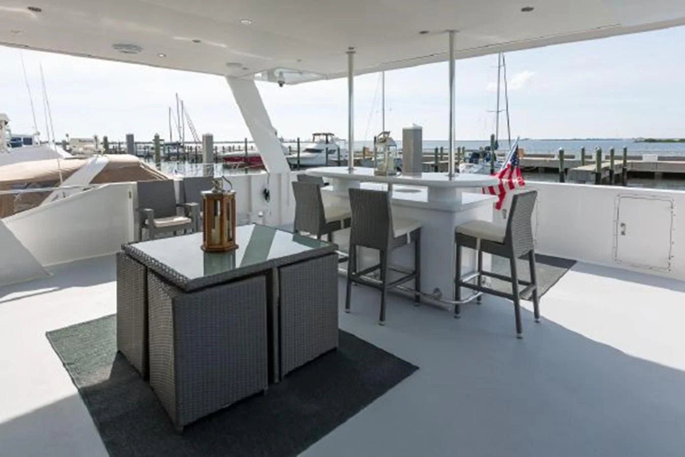 a room with a table and chairs aboard ISLAND SOUL Yacht for Sale