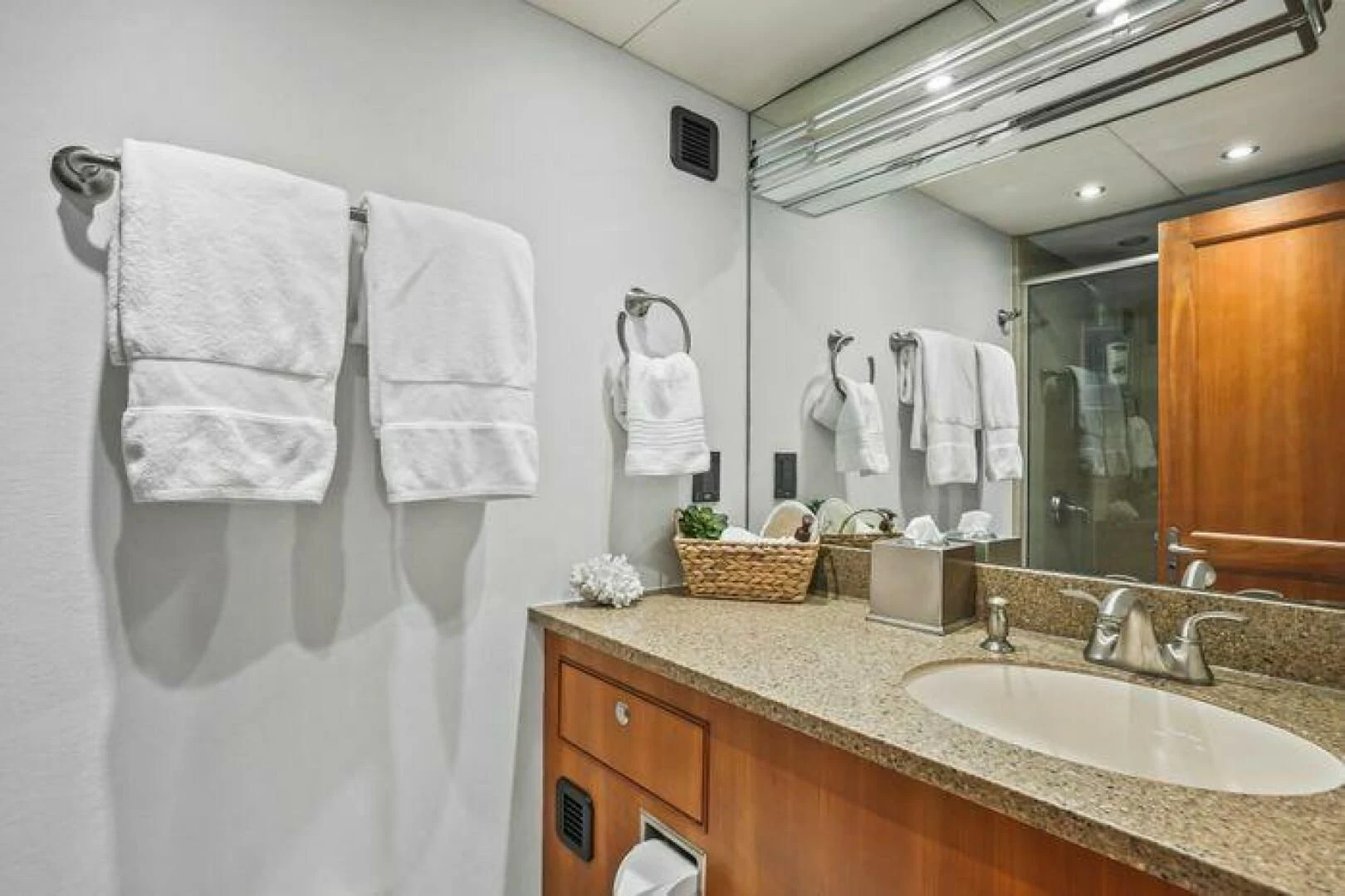 a bathroom with a large mirror aboard ISLAND SOUL Yacht for Sale