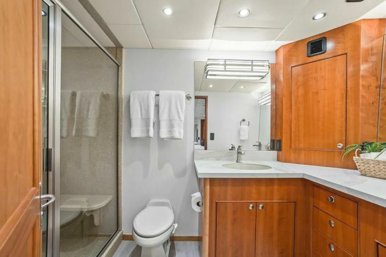 a bathroom with a glass shower aboard ISLAND SOUL Yacht for Sale