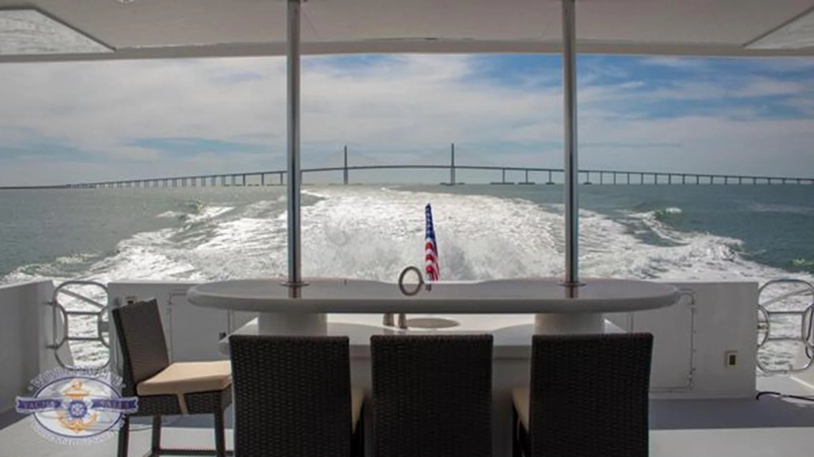 a table with chairs on it aboard ISLAND SOUL Yacht for Sale