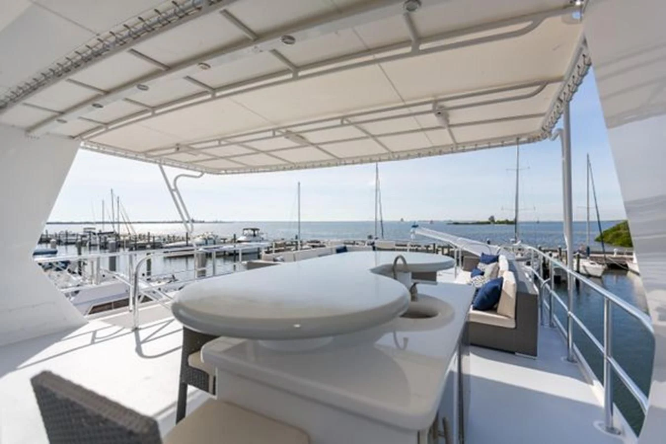 a large white boat on a deck aboard ISLAND SOUL Yacht for Sale