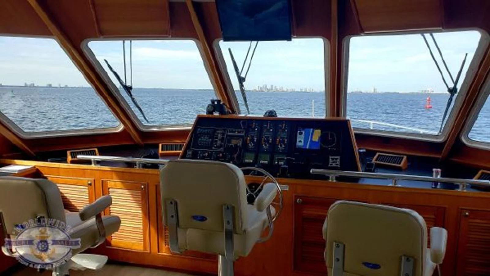 inside of a vehicle with a large window and a view of the mountains aboard ISLAND SOUL Yacht for Sale