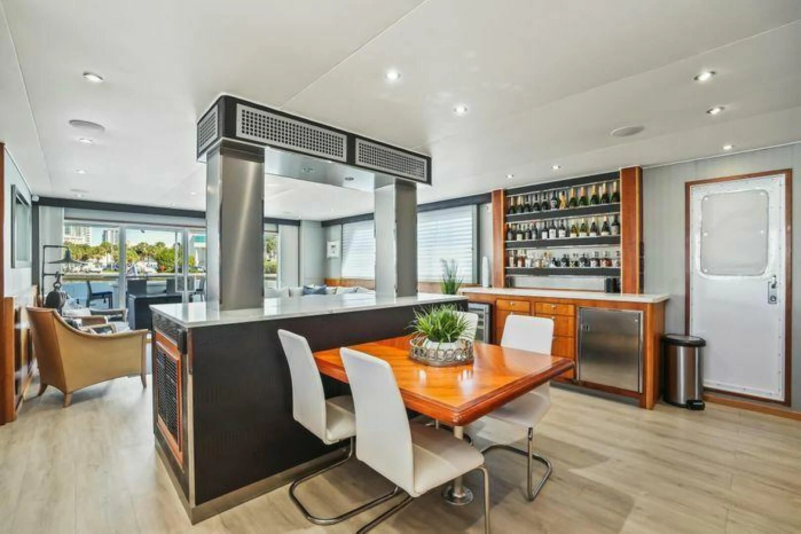 a kitchen with a table and chairs aboard ISLAND SOUL Yacht for Sale