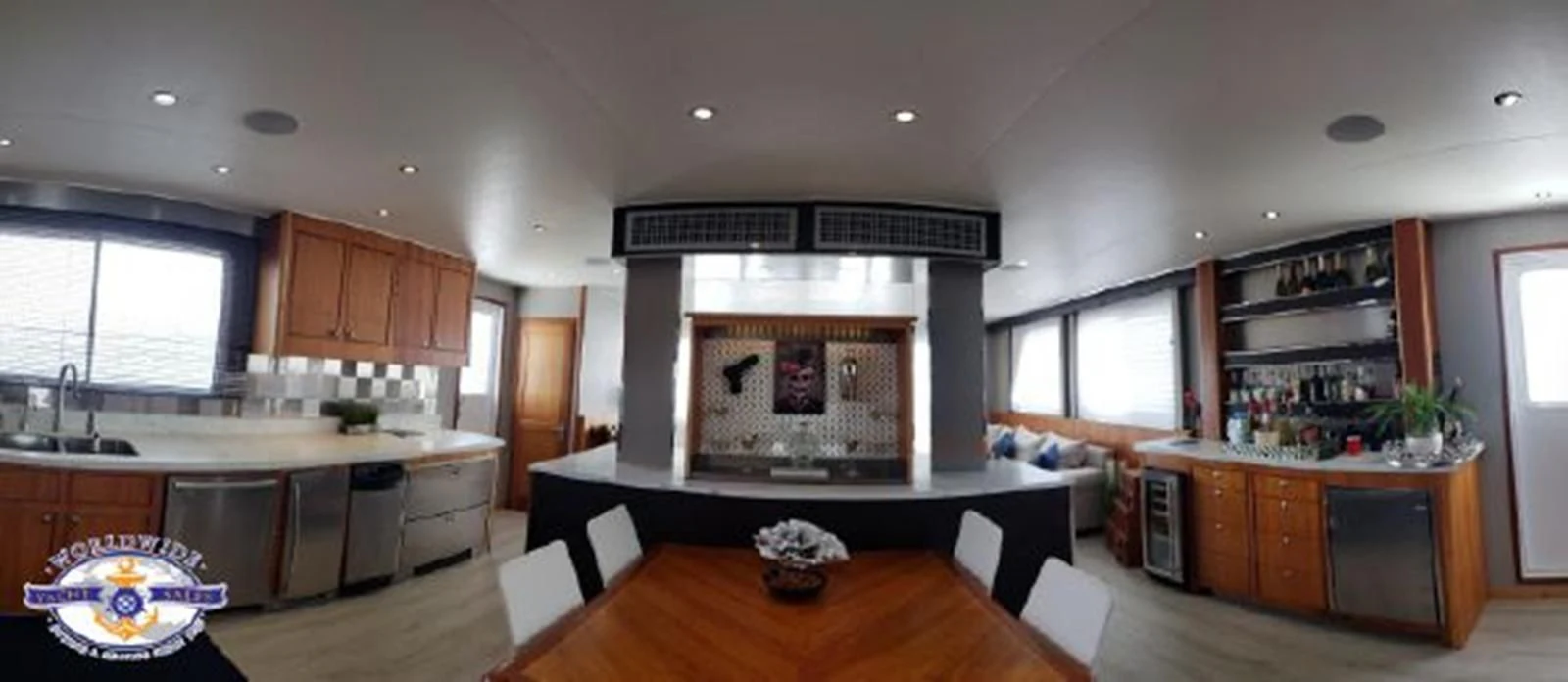 a kitchen with a fireplace aboard ISLAND SOUL Yacht for Sale