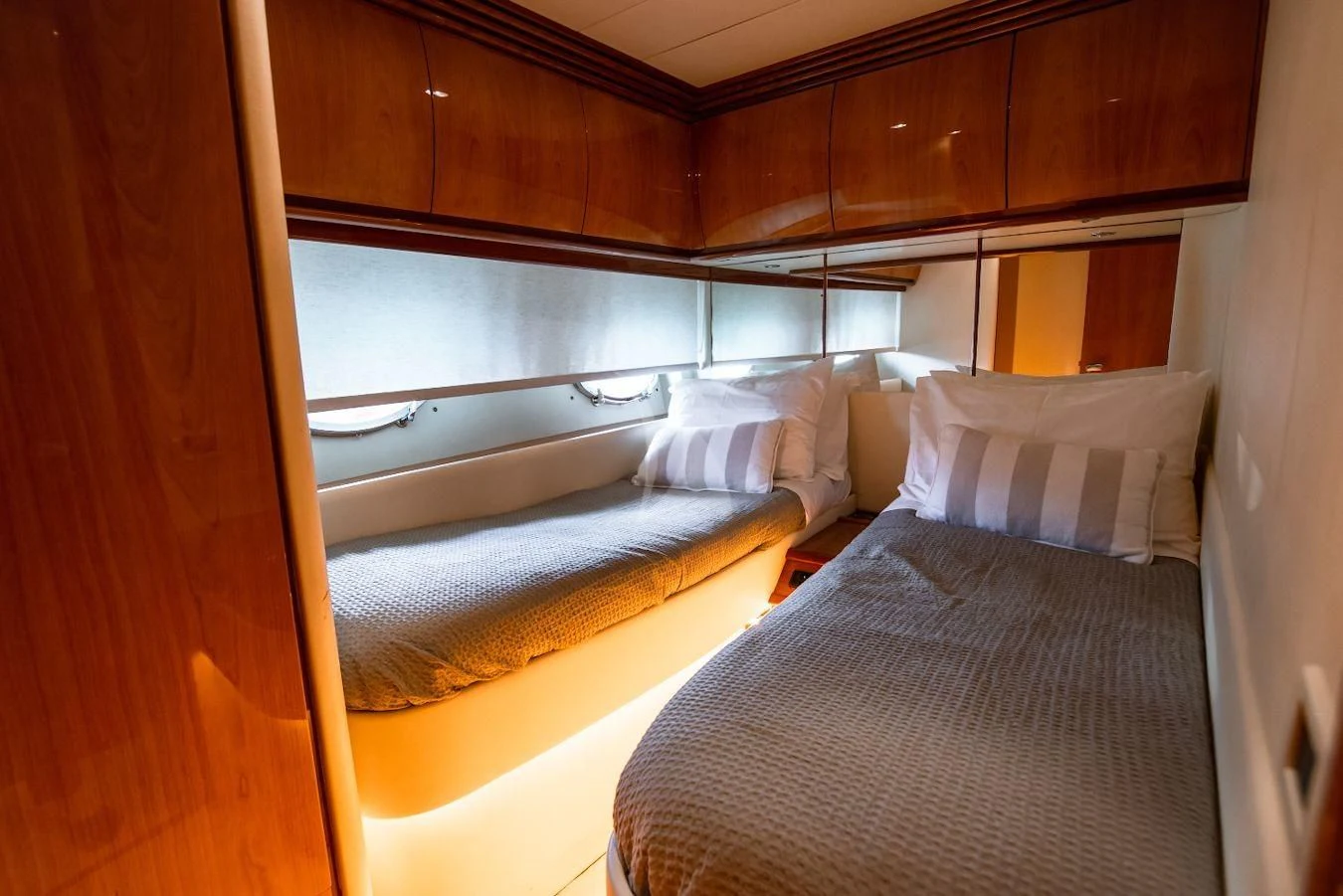 a room with two beds aboard AXION Yacht for Charter