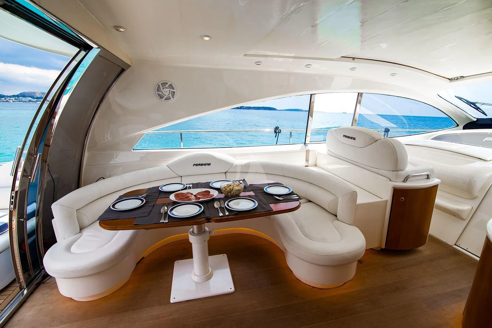 a white toilet in a room aboard AXION Yacht for Charter