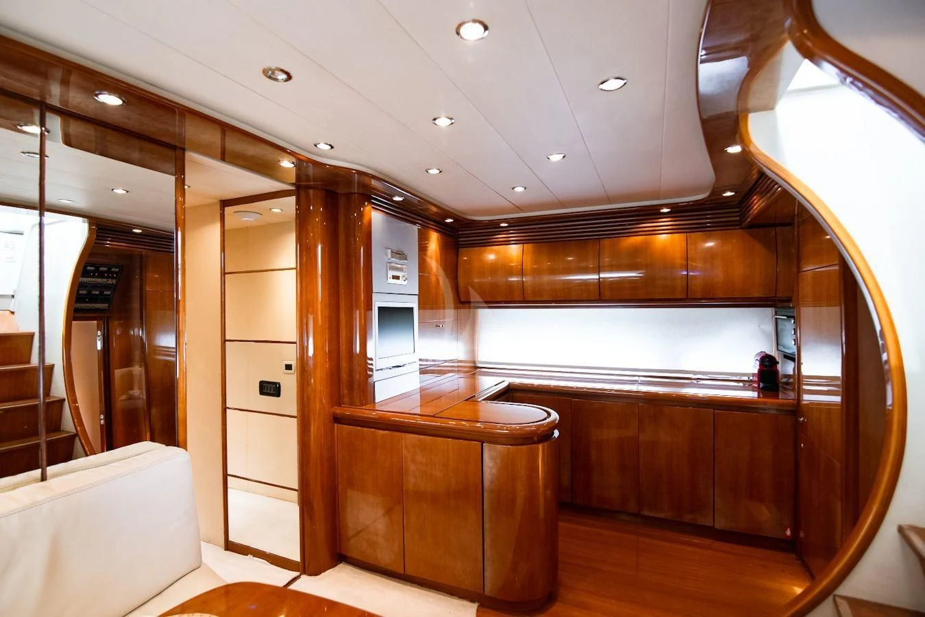 a room with a counter and cabinets aboard AXION Yacht for Charter