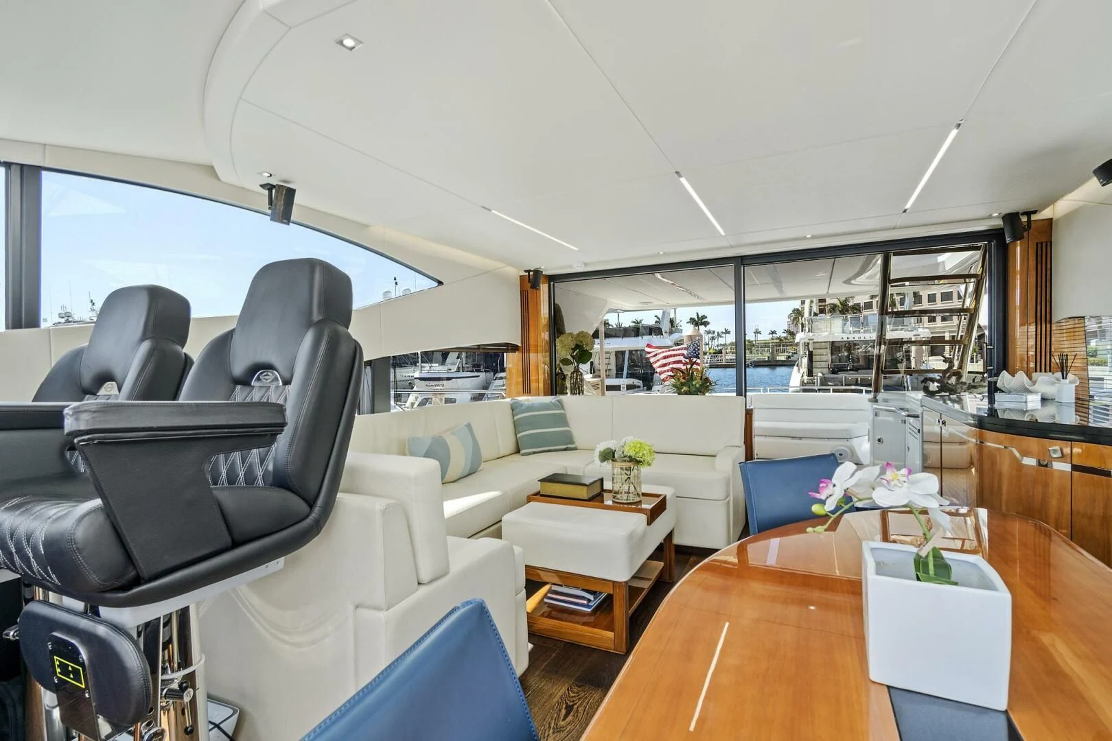 a living room with a large window aboard ONCE AROUND Yacht for Sale