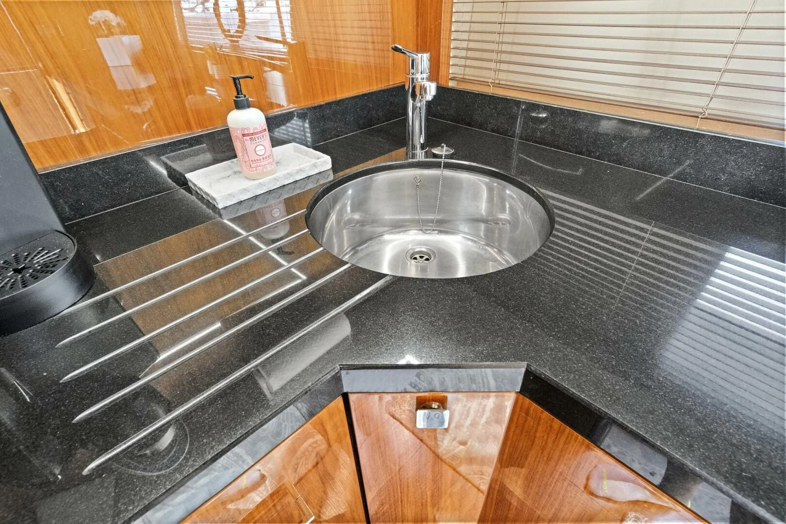 a kitchen sink with a glass top aboard ONCE AROUND Yacht for Sale