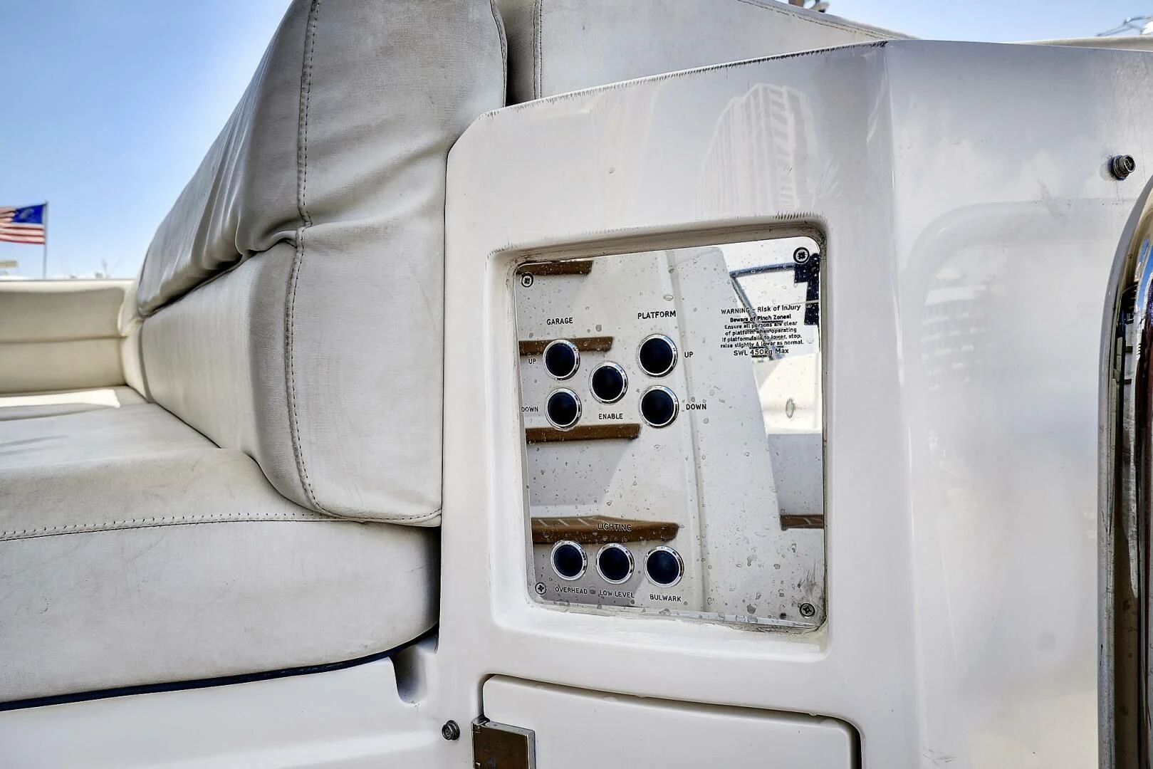 a white vehicle with a black panel aboard ONCE AROUND Yacht for Sale