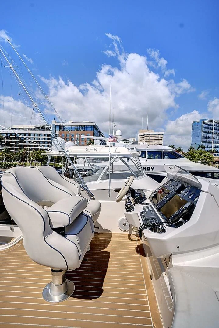 several white yachts on a dock aboard ONCE AROUND Yacht for Sale