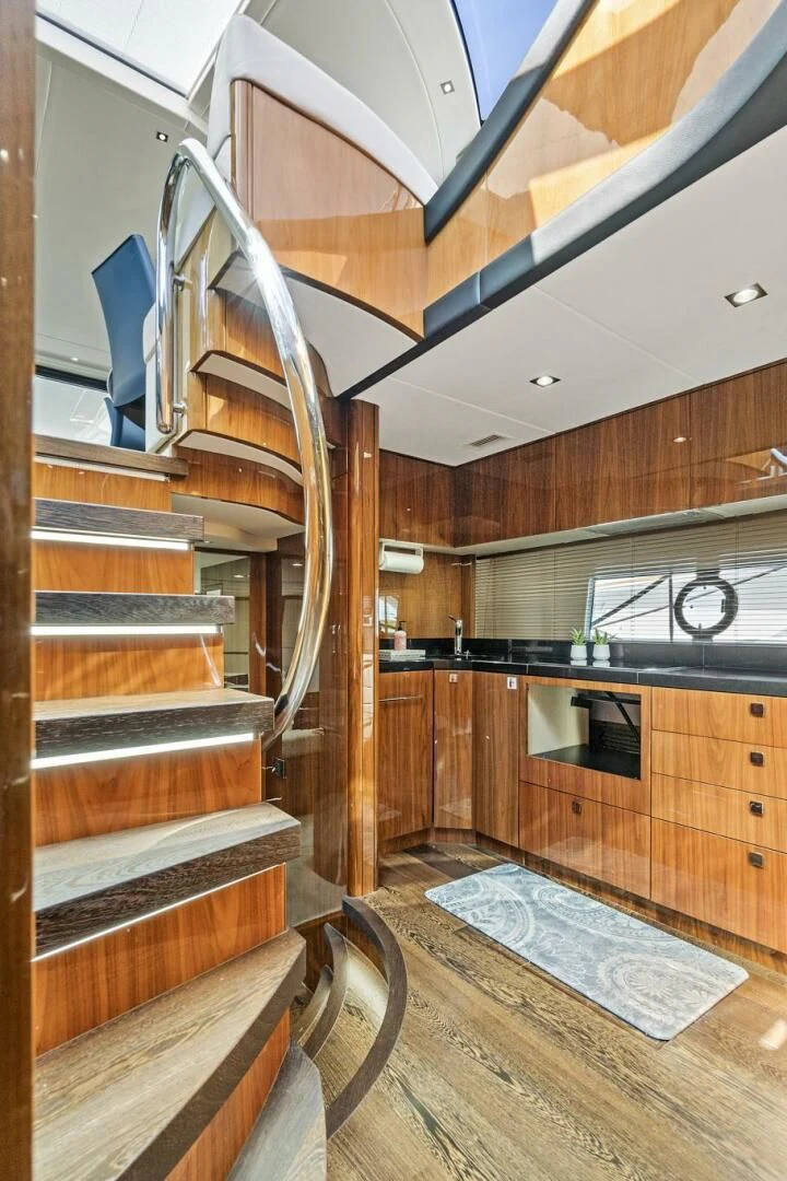 a wooden staircase in a house aboard ONCE AROUND Yacht for Sale
