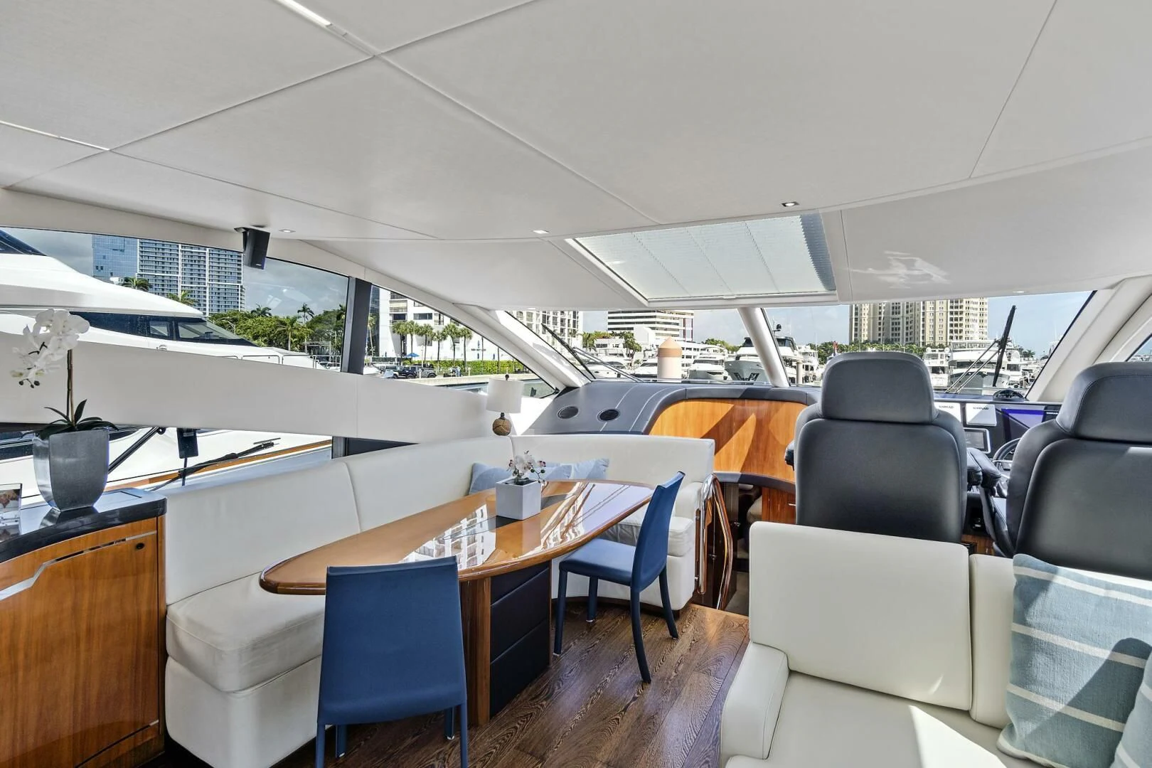 a room with tables and chairs aboard ONCE AROUND Yacht for Sale