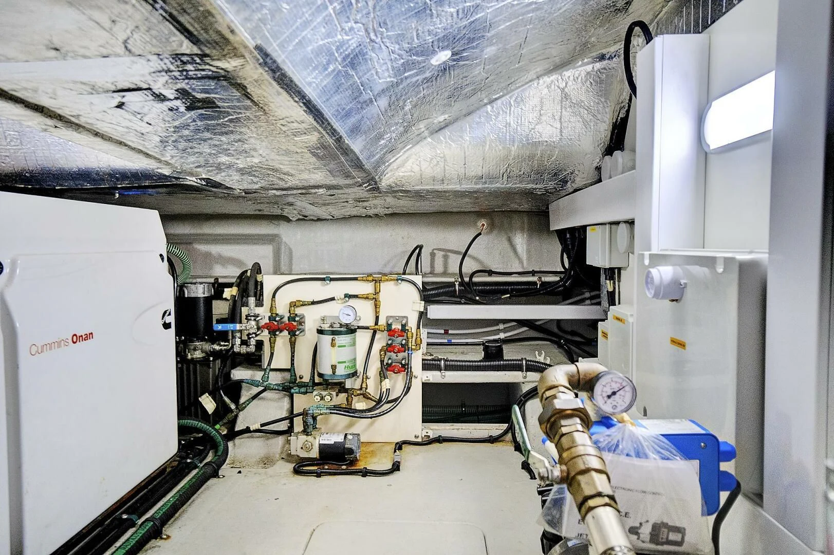 a large white machine with a large piece of equipment in it aboard ONCE AROUND Yacht for Sale