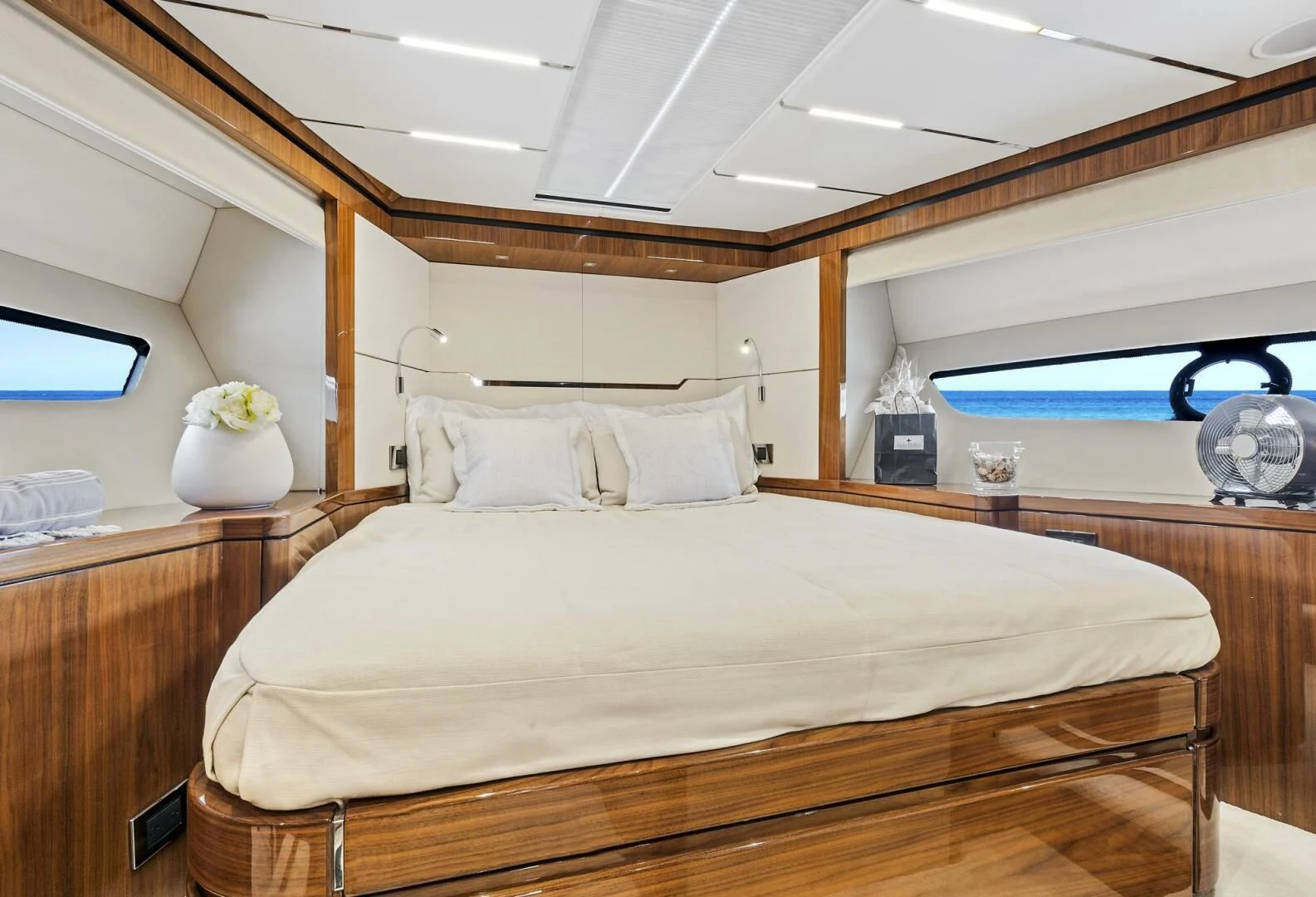 a bedroom with a bed and a television aboard ONCE AROUND Yacht for Sale