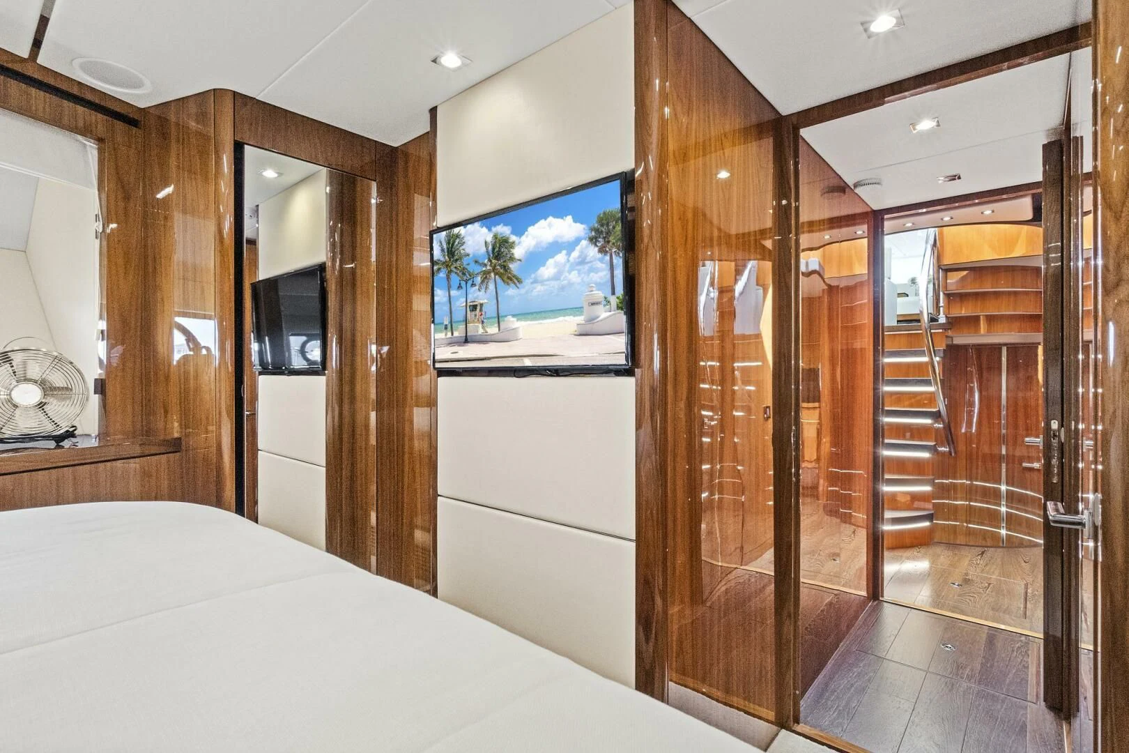 a room with a bed and a closet aboard ONCE AROUND Yacht for Sale