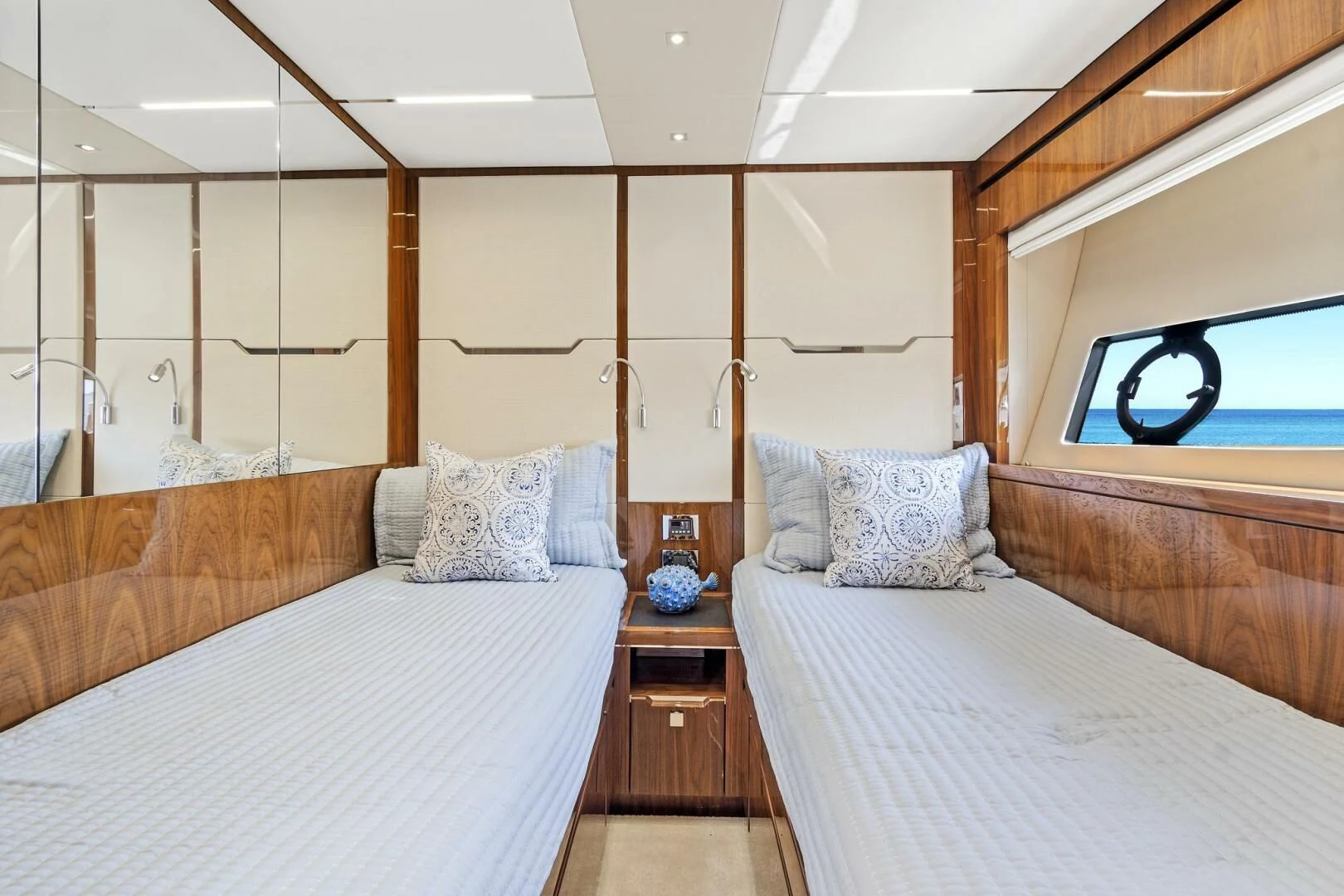 a bedroom with two beds aboard ONCE AROUND Yacht for Sale