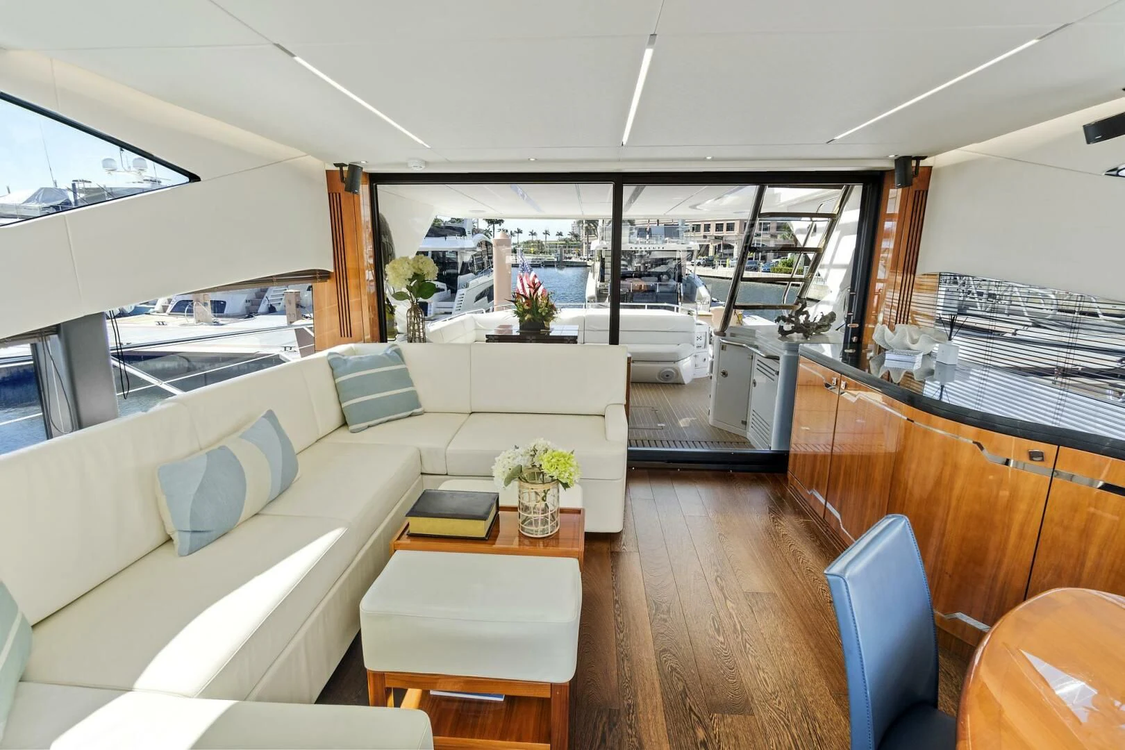 a living room with a wood floor aboard ONCE AROUND Yacht for Sale
