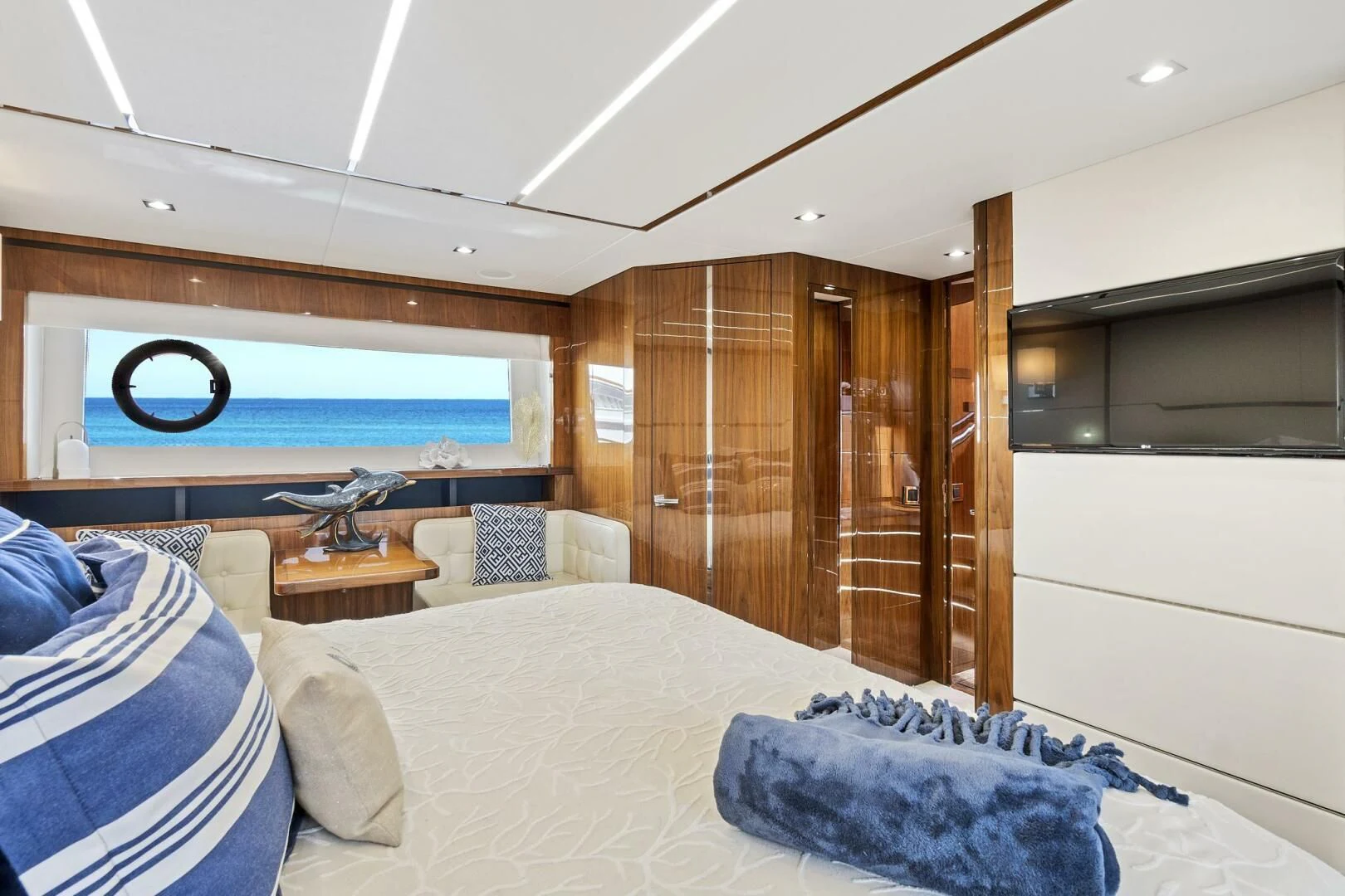 a bedroom with wood walls aboard ONCE AROUND Yacht for Sale