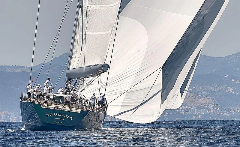 a group of people sailing on a sailboat aboard SAUDADE Yacht for Sale