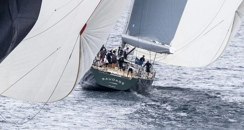 a group of people sailing on a sailboat aboard SAUDADE Yacht for Sale
