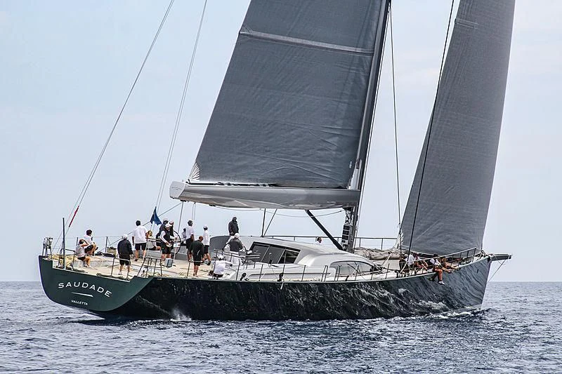 a group of people sailing on a boat aboard SAUDADE Yacht for Sale