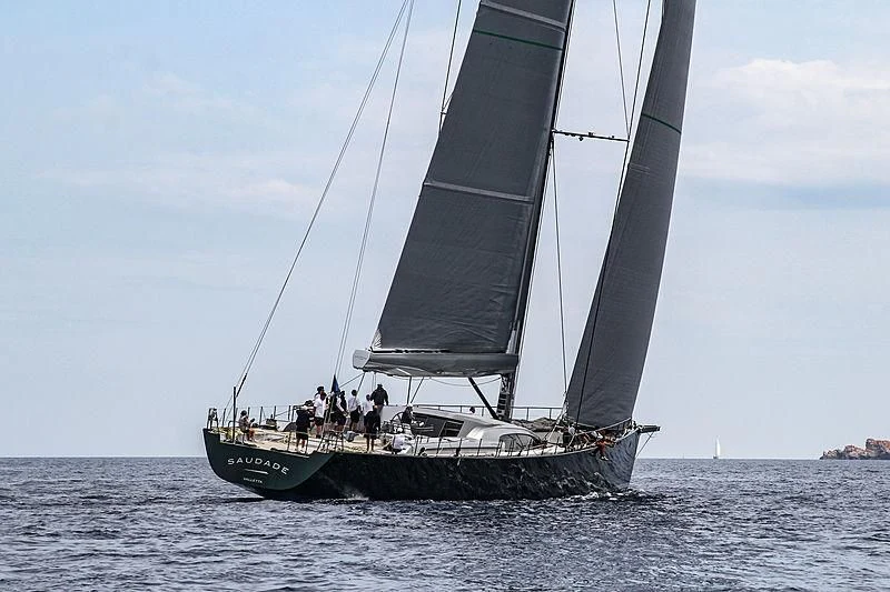 a sailboat with people on it aboard SAUDADE Yacht for Sale