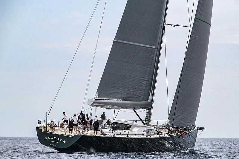 a group of people sailing on a boat aboard SAUDADE Yacht for Sale