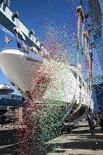 a large ship with a large crowd of people around it aboard AZURE DREAMS Yacht for Sale