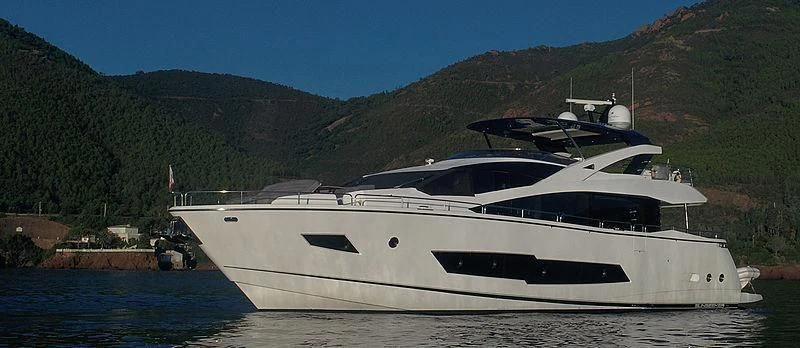 a white yacht on a lake aboard RIANNA Yacht for Sale