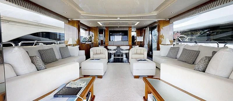 a large living room with a large open window aboard RIANNA Yacht for Sale