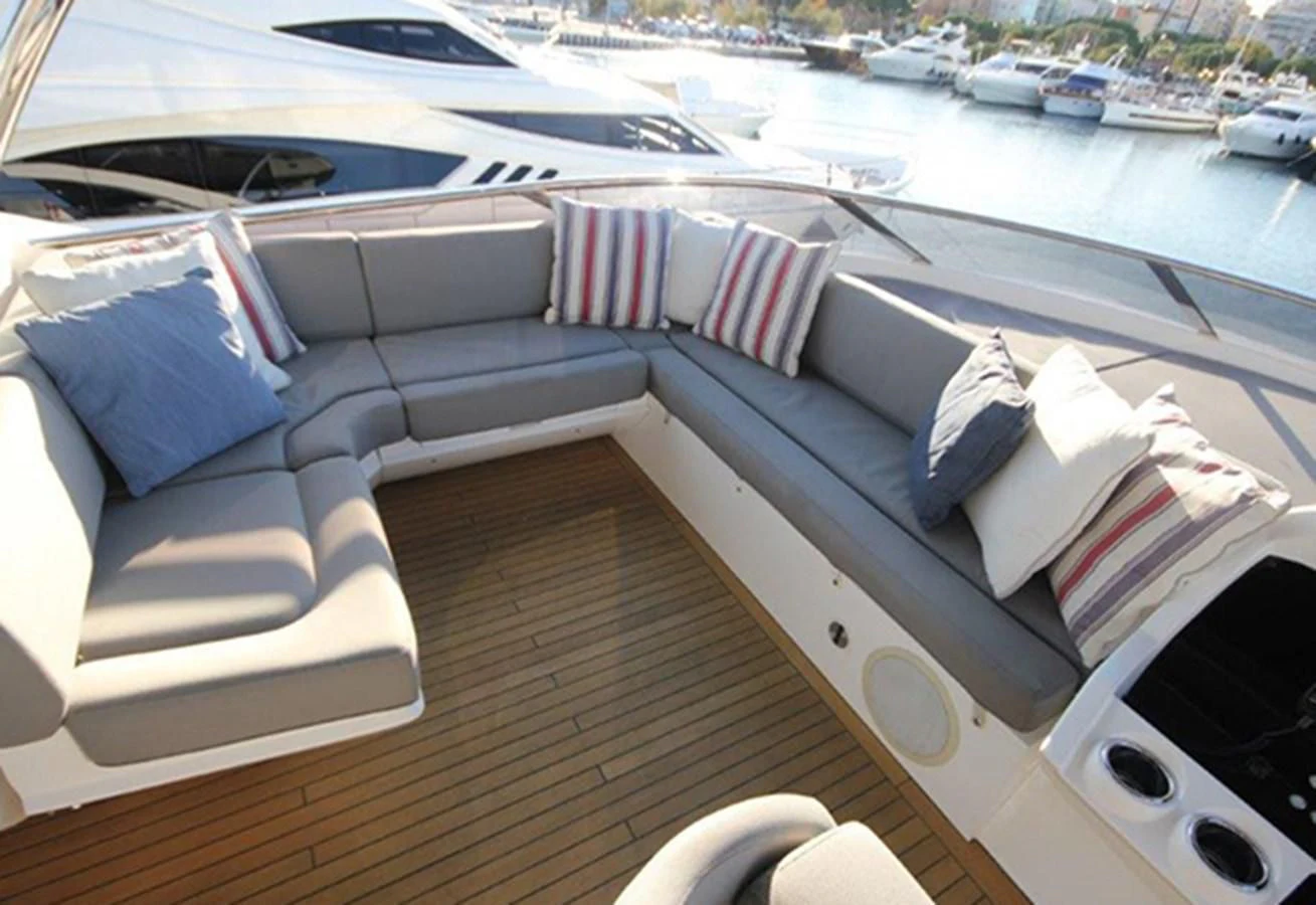 a car with a deck and a view of a city aboard RIANNA Yacht for Sale