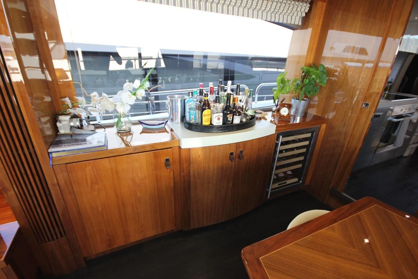 a kitchen with a countertop sink and cabinets aboard RIANNA Yacht for Sale