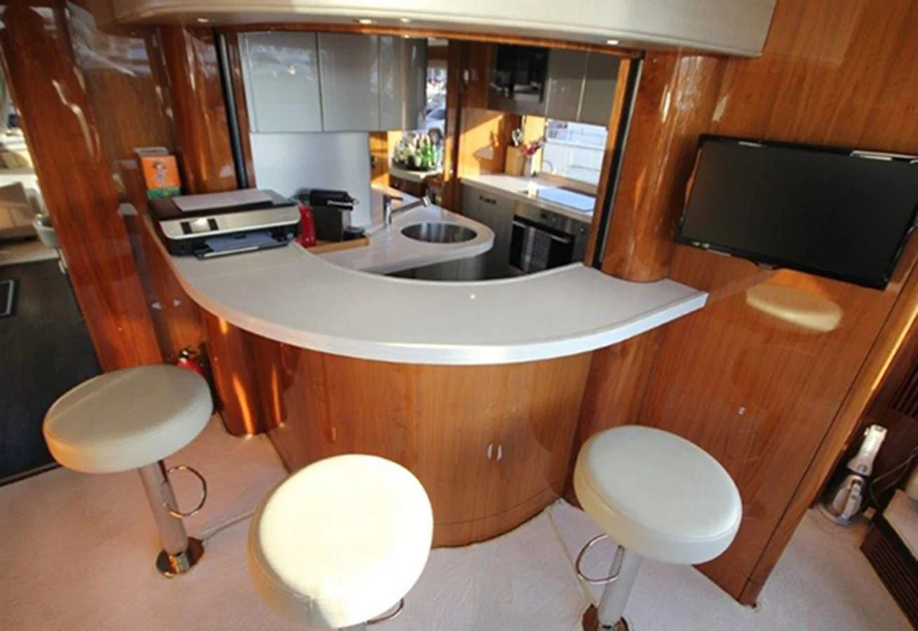 a kitchen with a large island aboard RIANNA Yacht for Sale