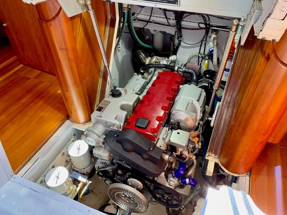 a car engine with a red car aboard HEROINA Yacht for Sale