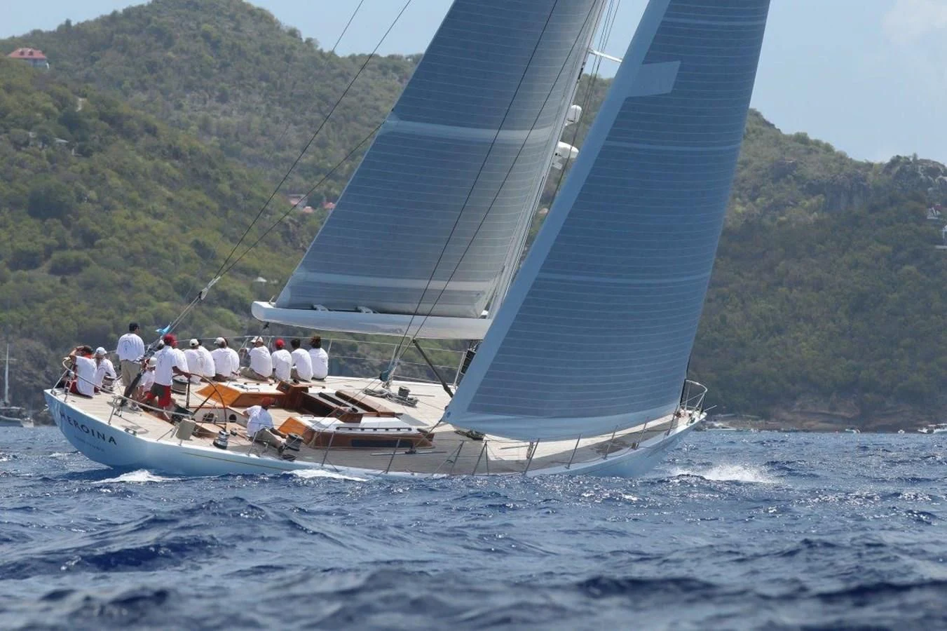 a group of people on a sailboat aboard HEROINA Yacht for Sale