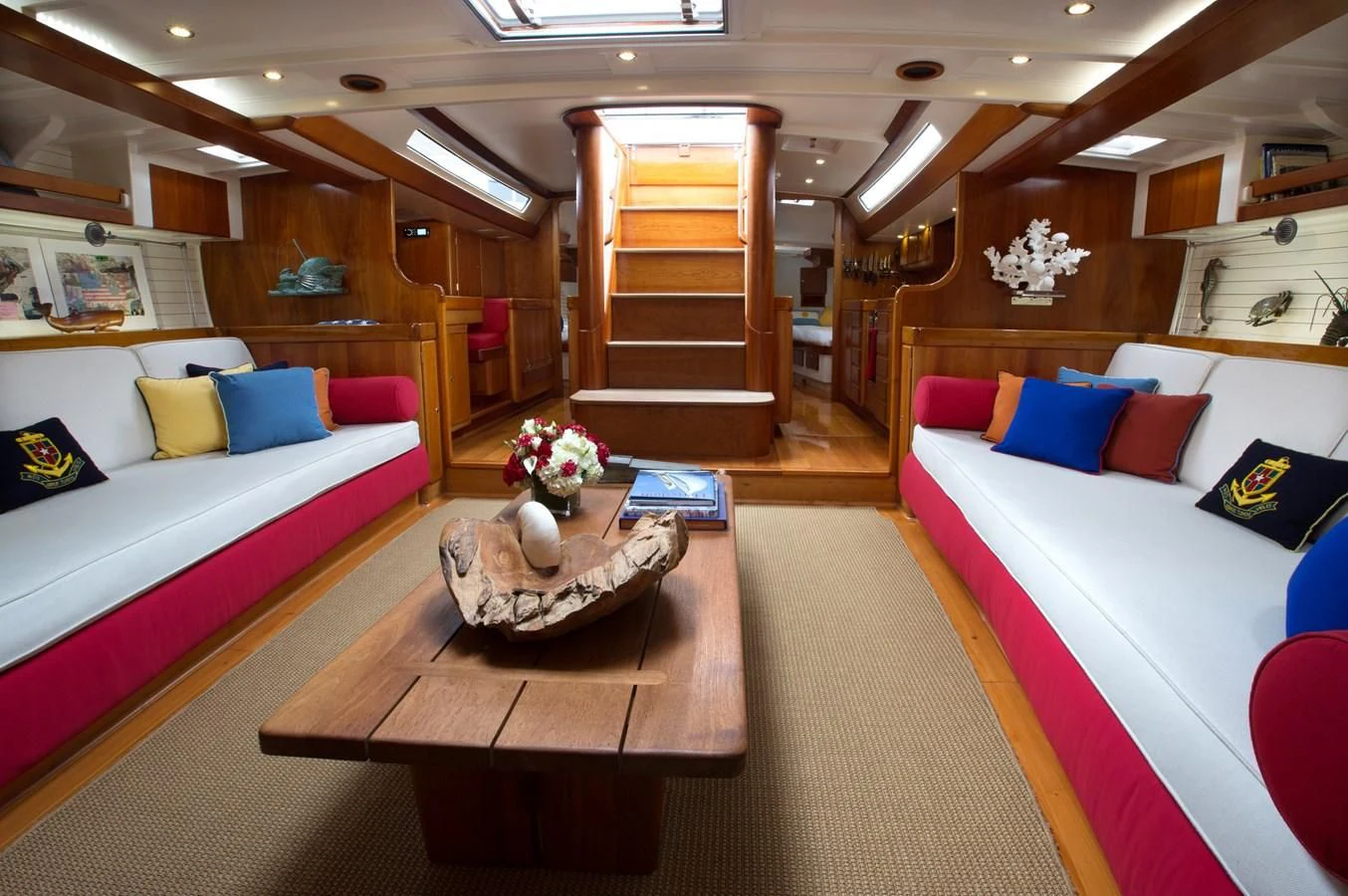 a room with a bed and a table aboard HEROINA Yacht for Sale