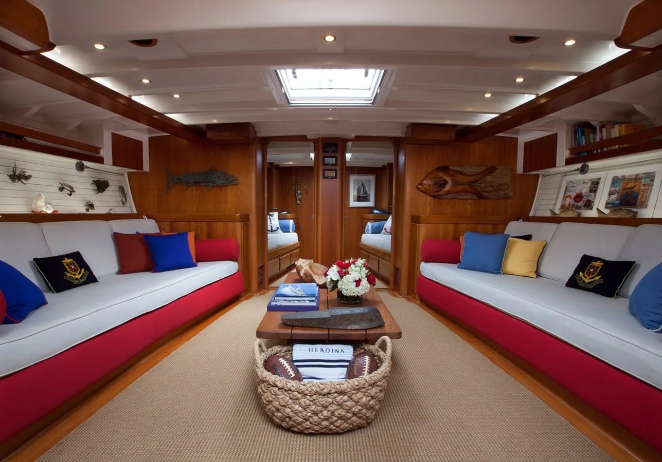 a room with a bed and a table aboard HEROINA Yacht for Sale