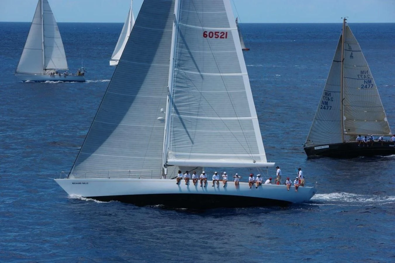 a group of people sailing on a boat aboard HEROINA Yacht for Sale