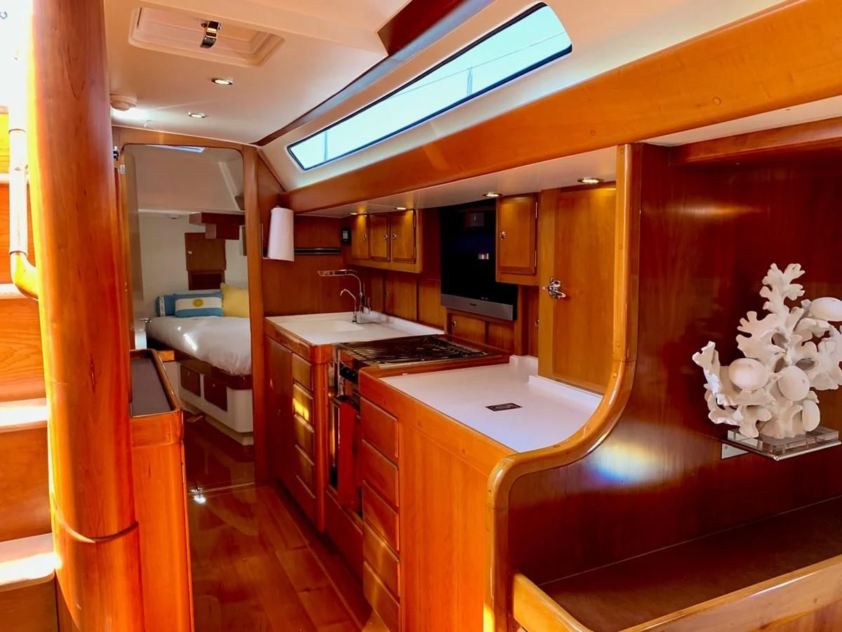 a bathroom with a countertop sink and cabinets aboard HEROINA Yacht for Sale