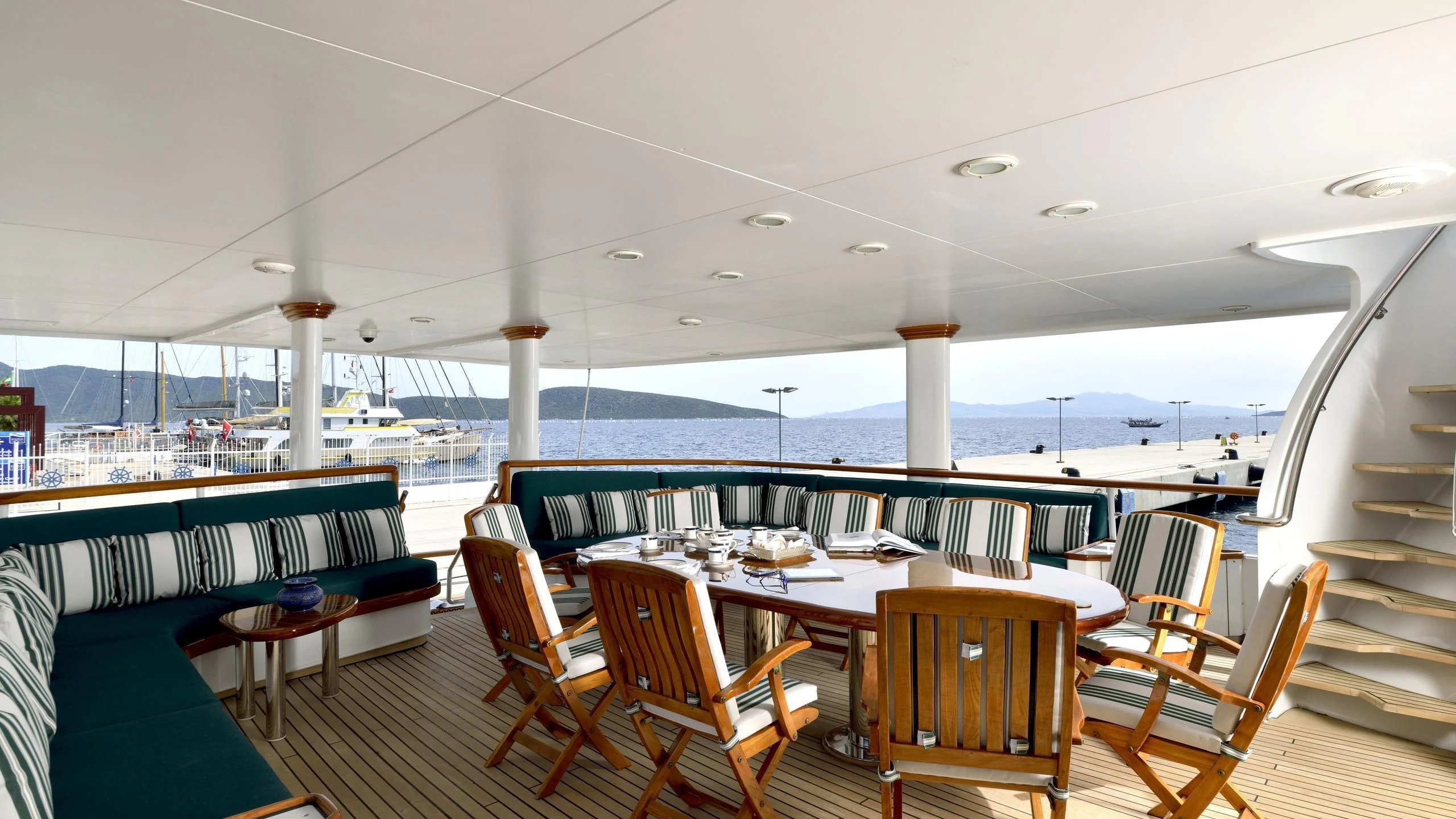 a room with a table and chairs aboard THE MERCY BOYS Yacht for Sale