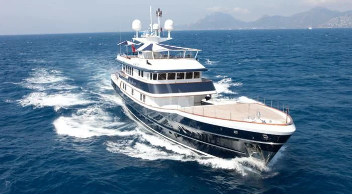 a large white boat in the water aboard THE MERCY BOYS Yacht for Sale
