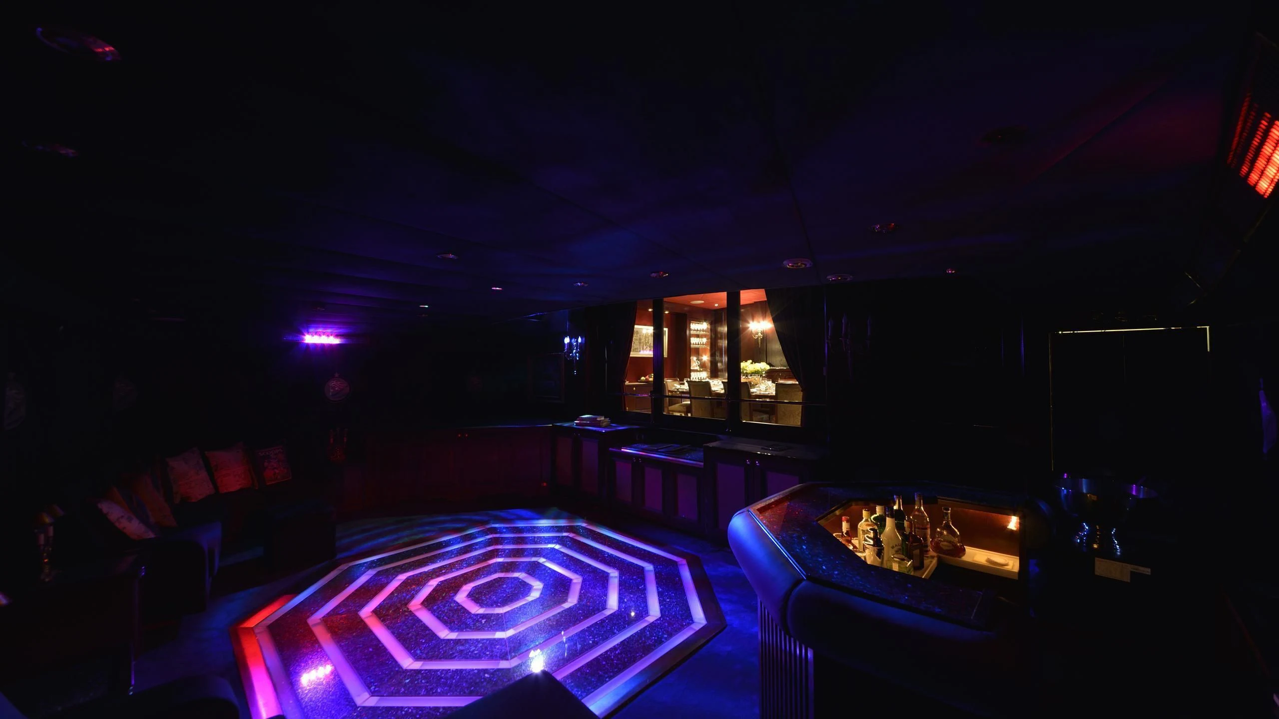 a bar with a pool table and a bar in the background aboard THE MERCY BOYS Yacht for Sale