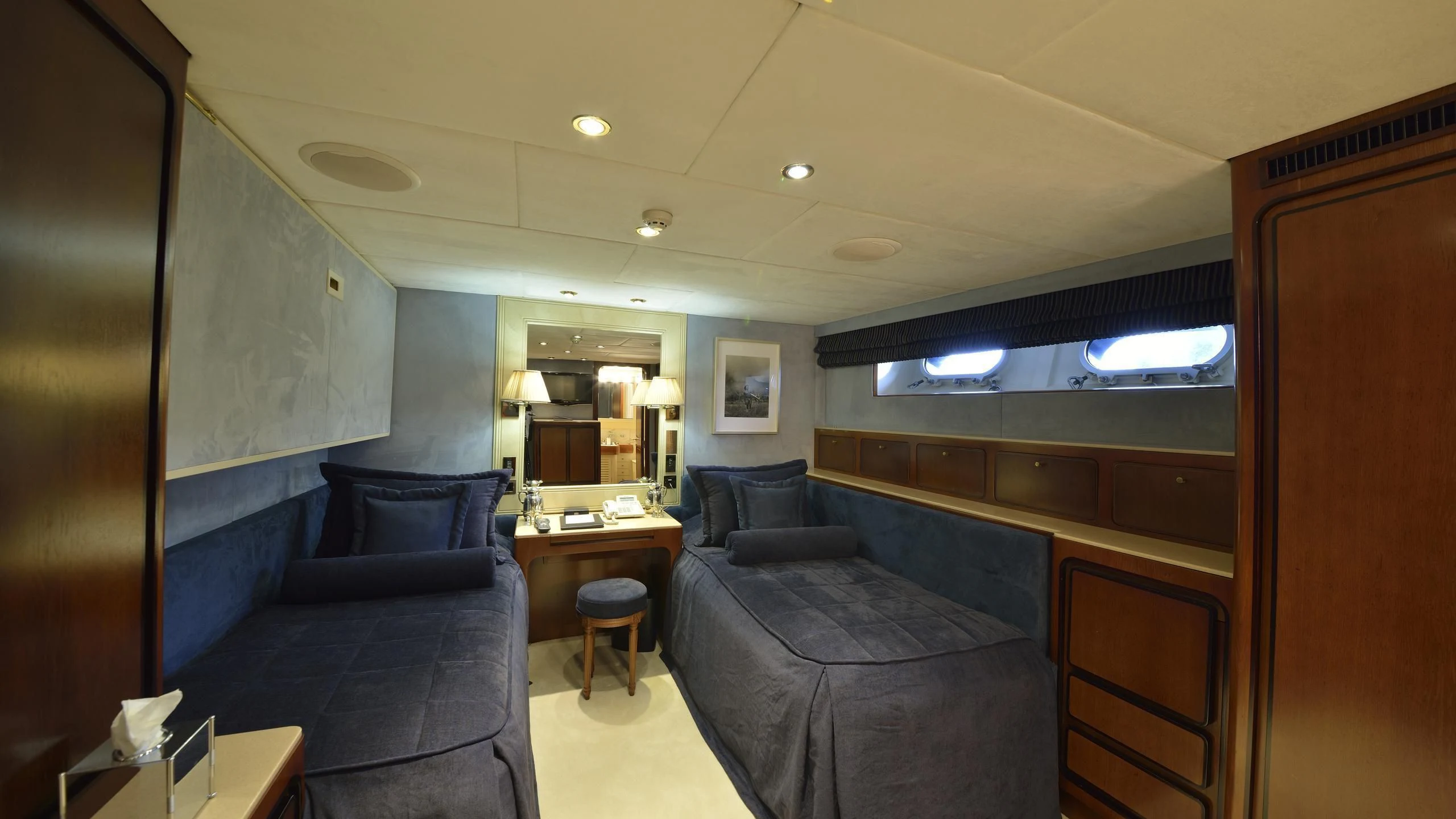 a room with a bed and a desk aboard THE MERCY BOYS Yacht for Sale