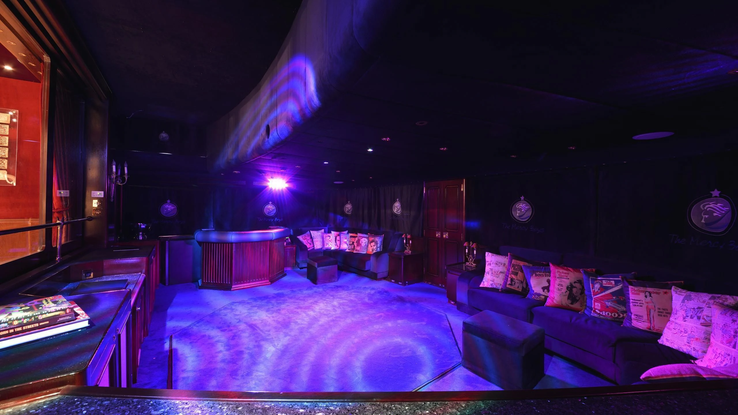 a room with a bed and a couch aboard THE MERCY BOYS Yacht for Sale