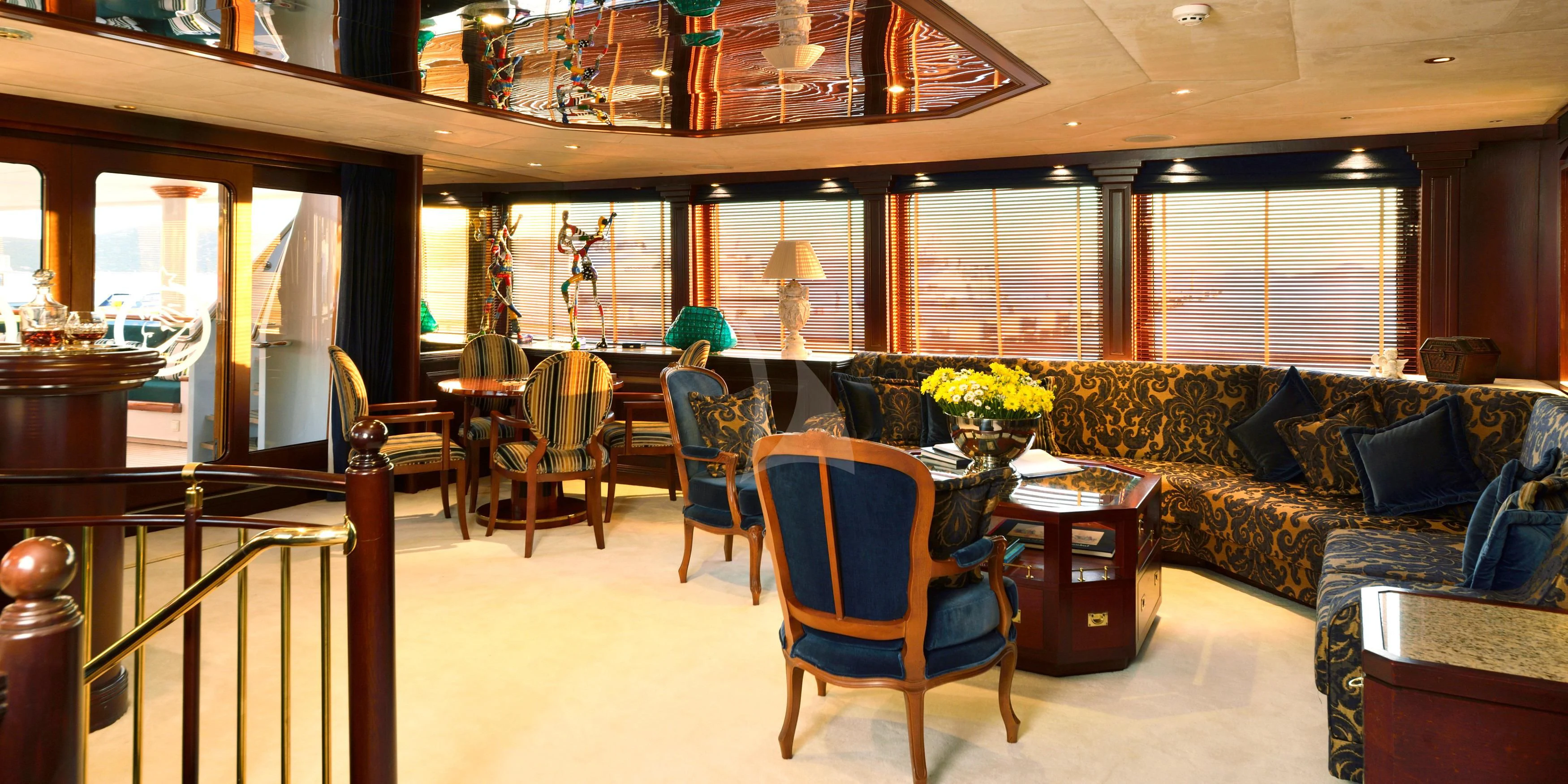 a living room with a couch and a table aboard THE MERCY BOYS Yacht for Sale